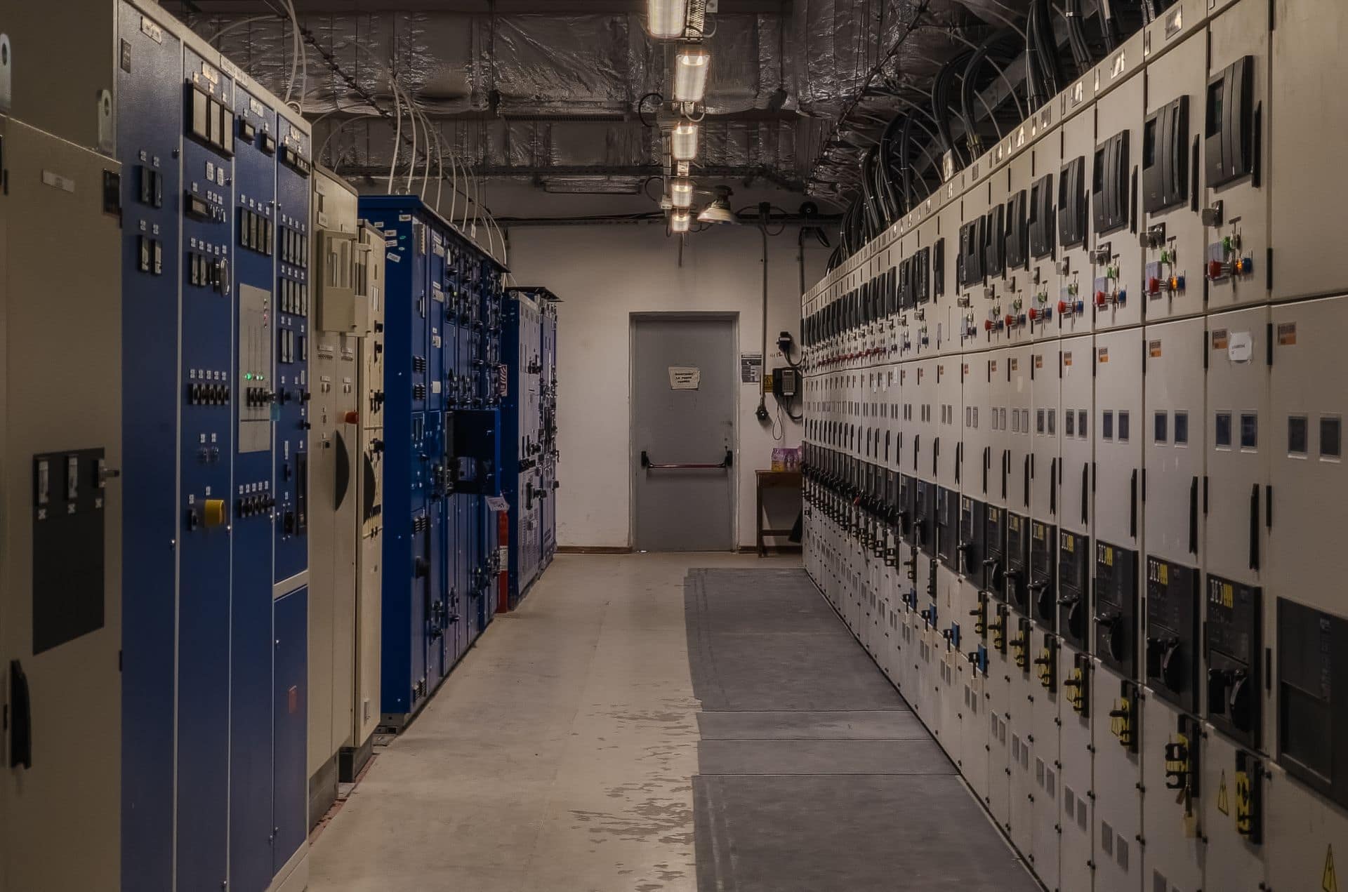 Row of control panels in an industrial electrical switch room